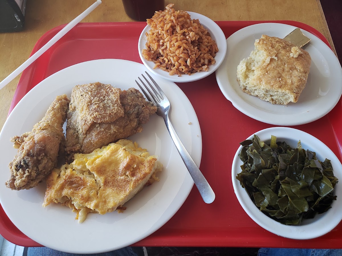 A full dinner tray at Workmen's Cafe: fried chicken, mac and cheese, red rice, collard greens and cornbread